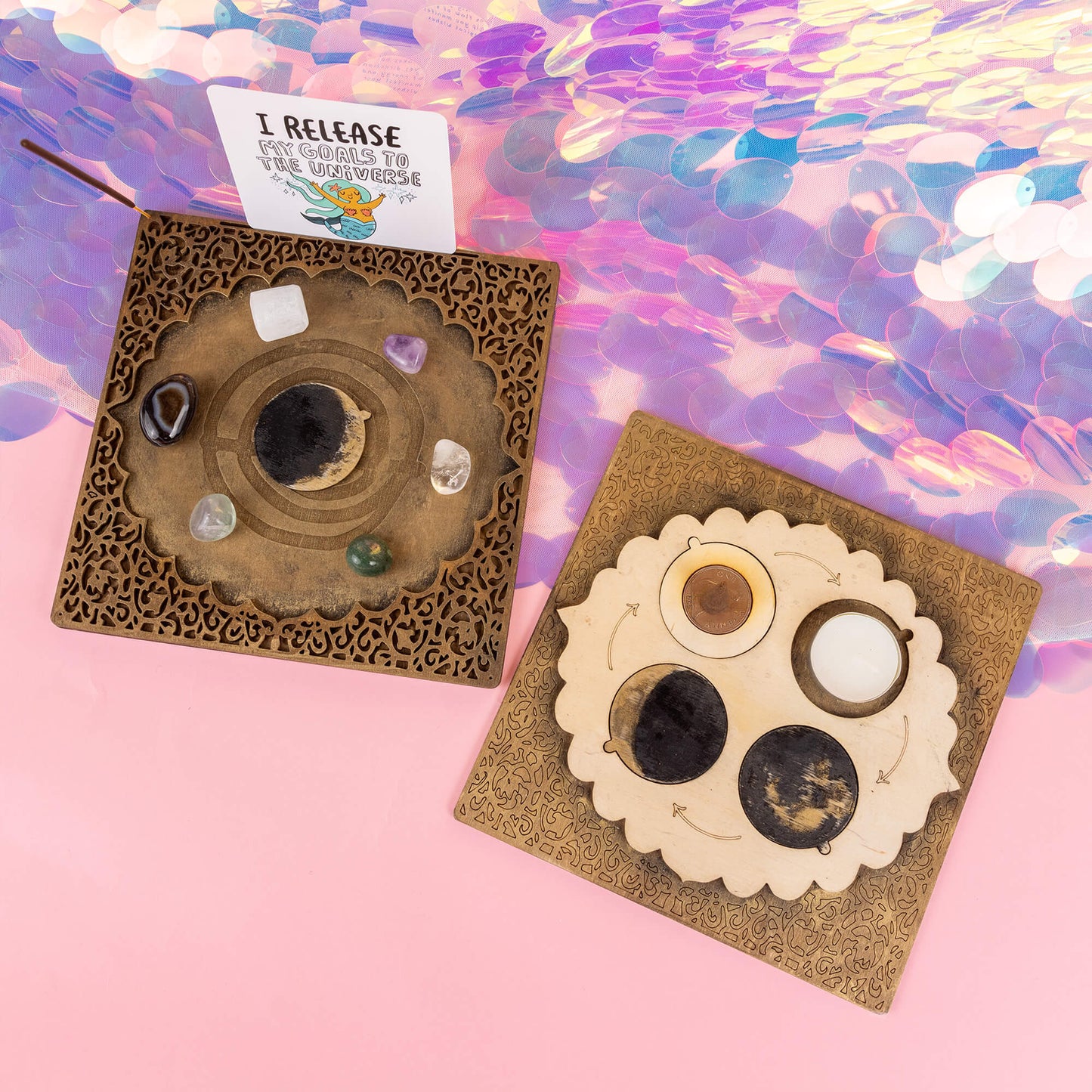 The Power Portal, set up on a holographic pink backdrop. Crystals, incense, and candles surround the boards, creating a magical ritual space for intention-setting and energy work.