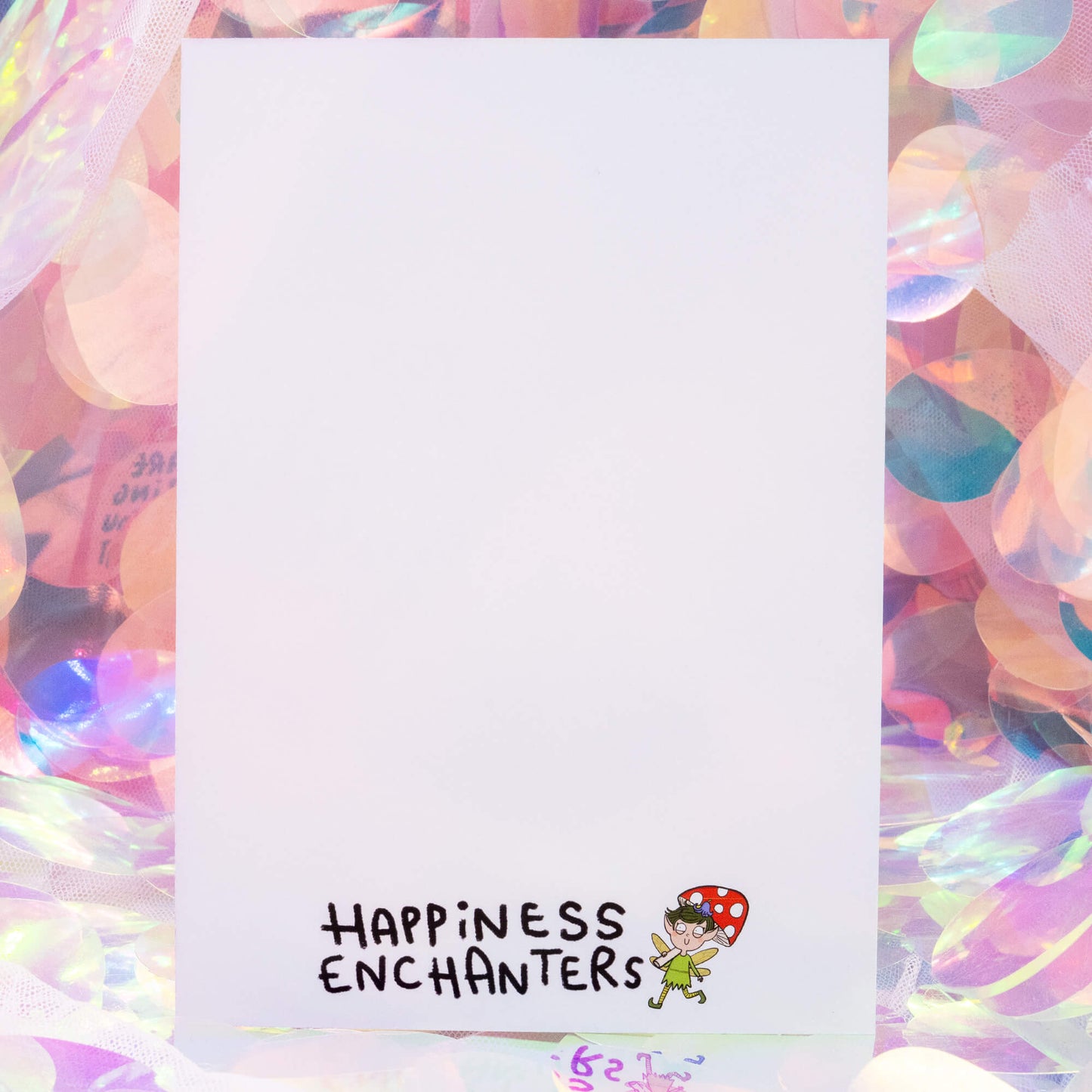 Reverse side of The ‘Fuck Up’ Ferret Postcard by Happiness Enchanters, with space for a message, address, and stamp, and a small illustration of a fairy holding a mushroom in the corner.